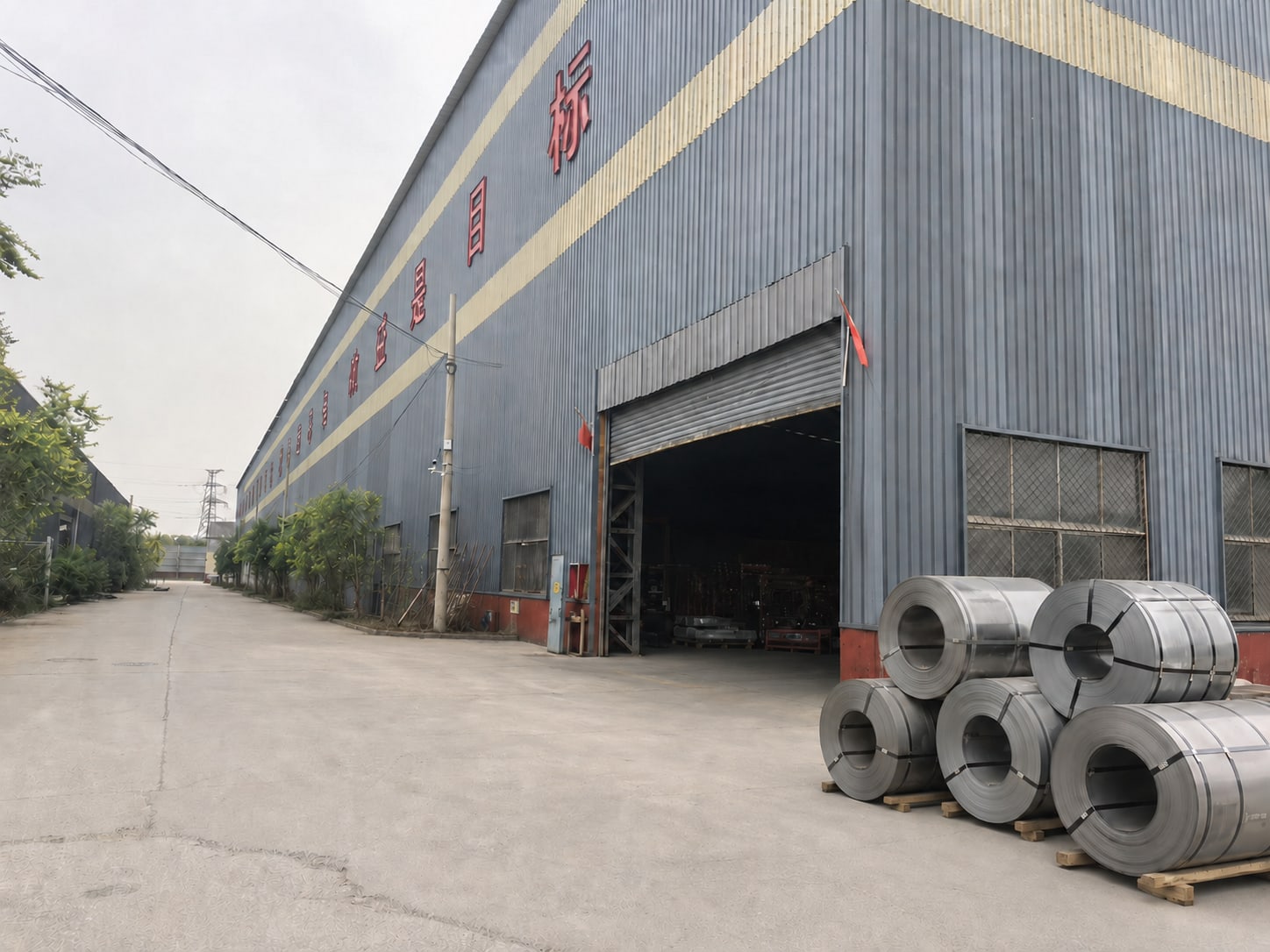 Factory entrance with steel coil materials